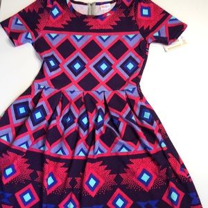 LuLaRoe Amelia Dress. She has pockets!!!